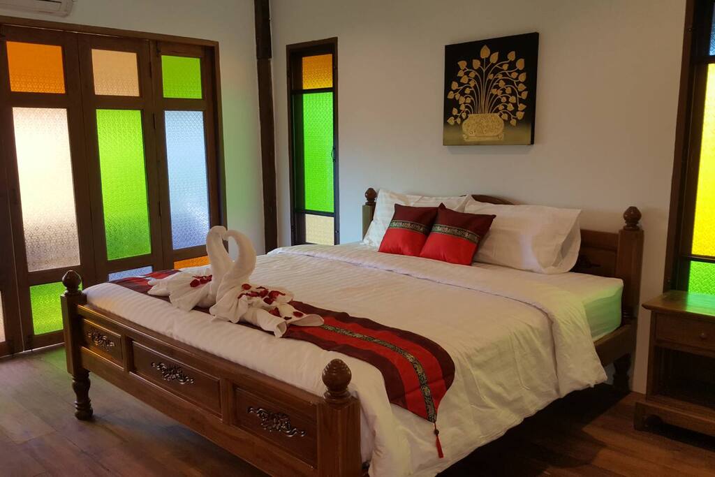 King size bed in bedroom 1