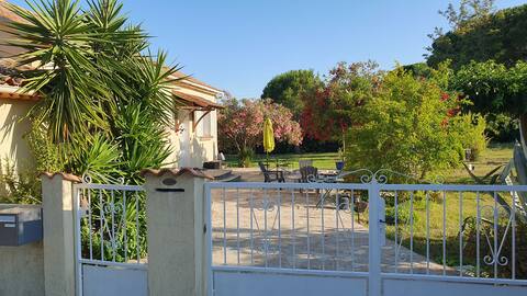 Near beach, house on large enclosed wooded grounds