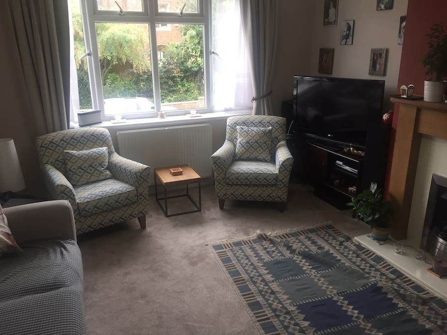 Living Room with TV, Sofa and also a 2 person dining table not visible on this pic