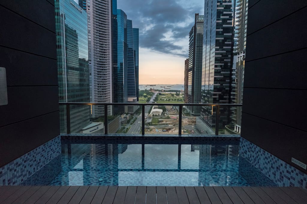 Enjoy a soak in the jacuzzi and take in a view of the modern jungle against the backdrop of the Straits of Singapore