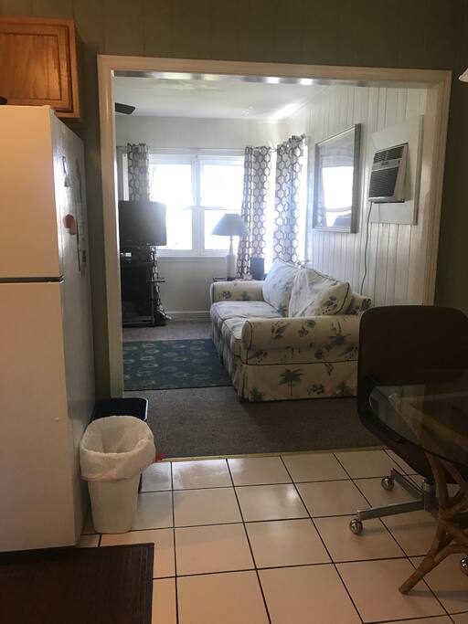 Looking into living room from kitchen/dining area