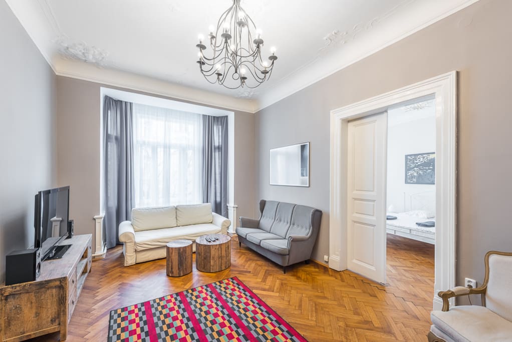 Living room with foldable sofa.