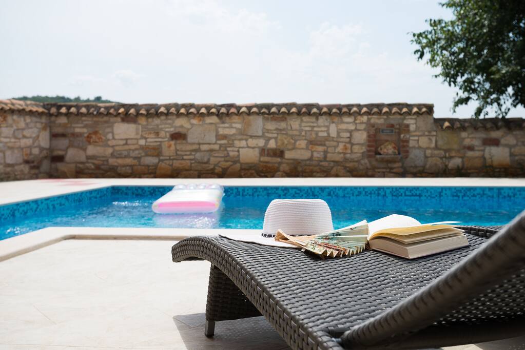 pool and chairs