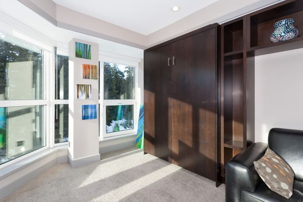 The murphy bed creates lots of room in the living area.