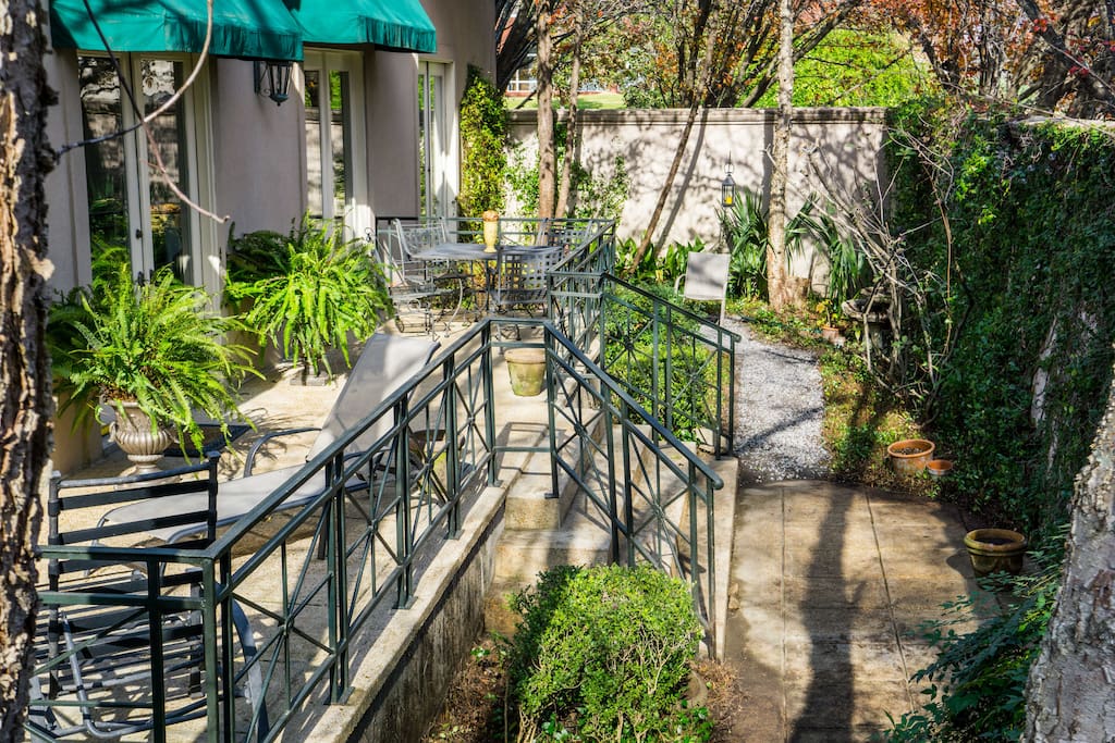 Lush, mature gardens in the courtyard with plenty of space for entertaining or peaceful retreat in the outdoors.