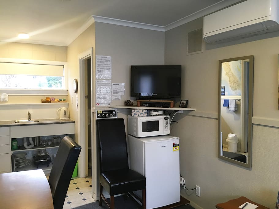 View of living area with heat pump