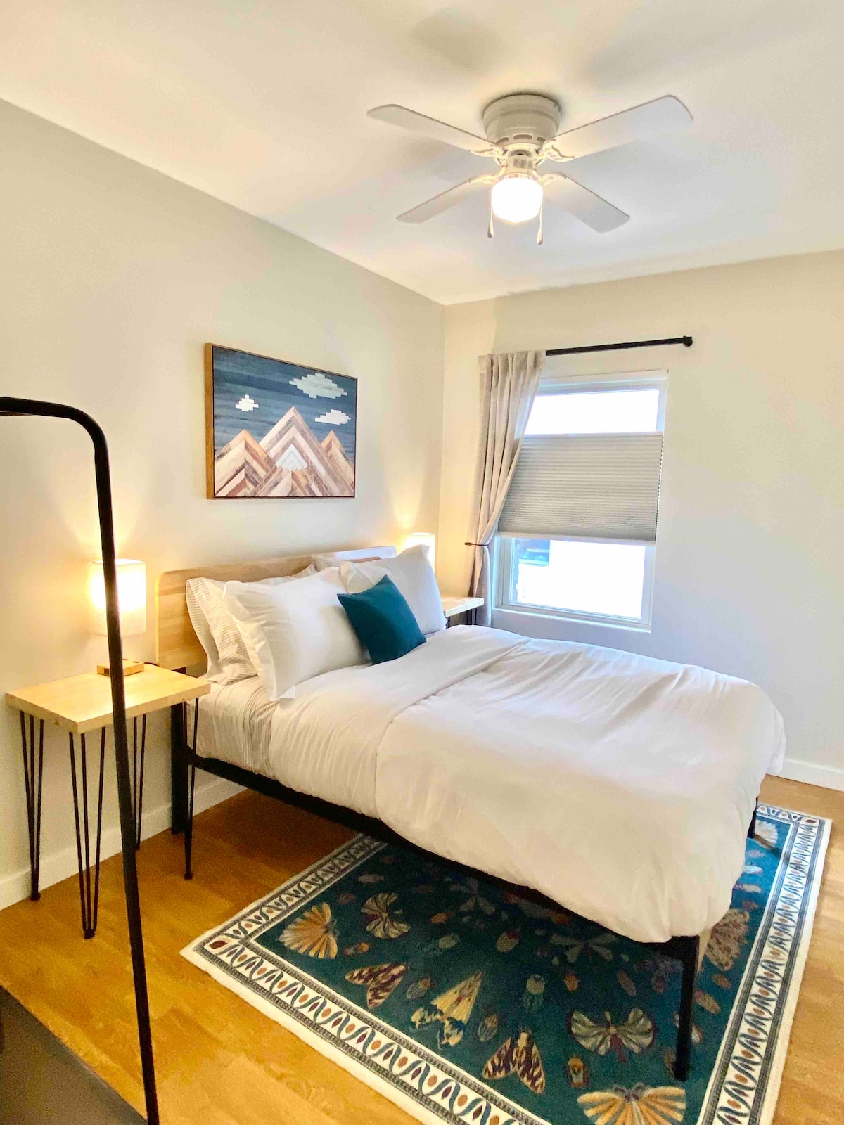 Full bed with luxurious linens.