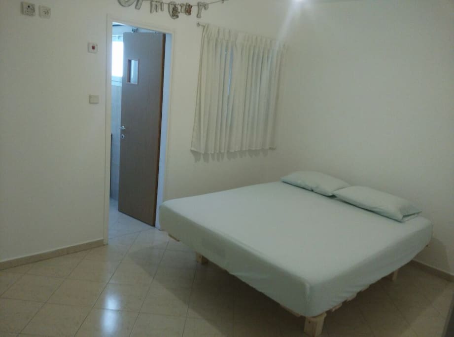 Queen Sized Bed in Master Bedroom