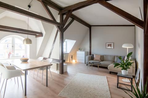 Popular Airbnb listing: smør – Scandinavian loft in an attic, 1 min to the harbor in Husum