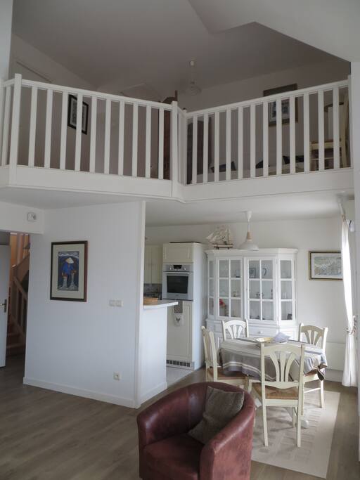 Galleried open plan living area.