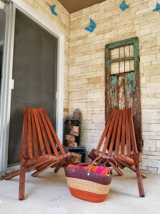 Private outdoor lounge with your own roof fan.