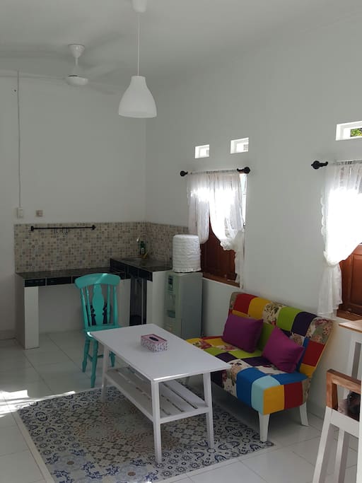 Small and warm living room and mini kitchen