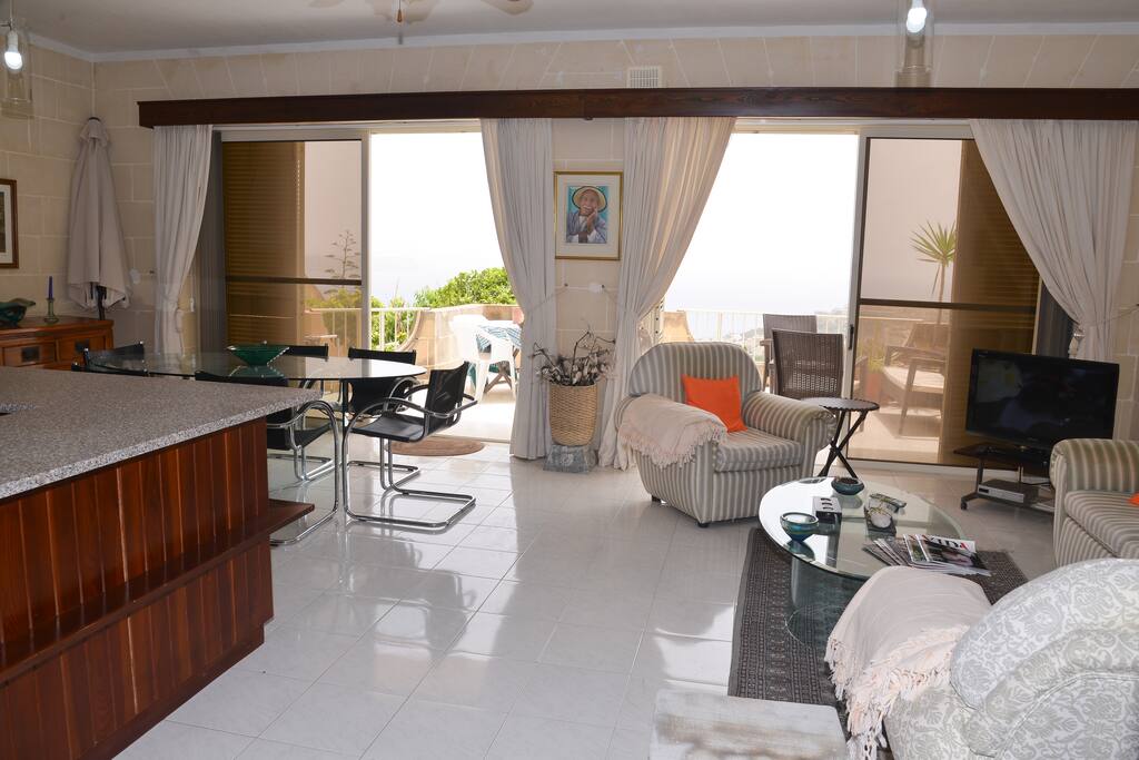 Living area leading to terrace and garden.
