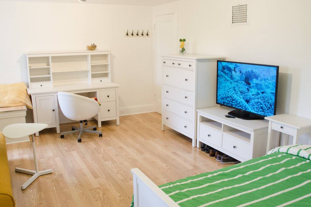 There's a TV, desk, swivel chair, and large dresser drawers. If you like TV, there is Netflix, commercial free Hulu, Amazon prime video via a Roku 3 player.