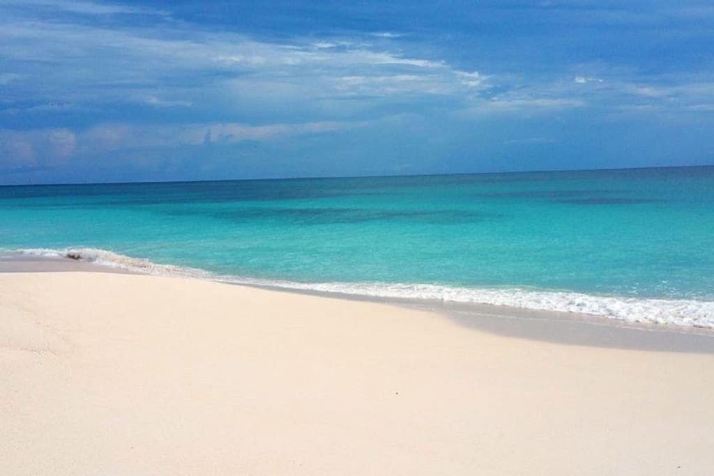 Walk for miles on our secluded pink sand beach