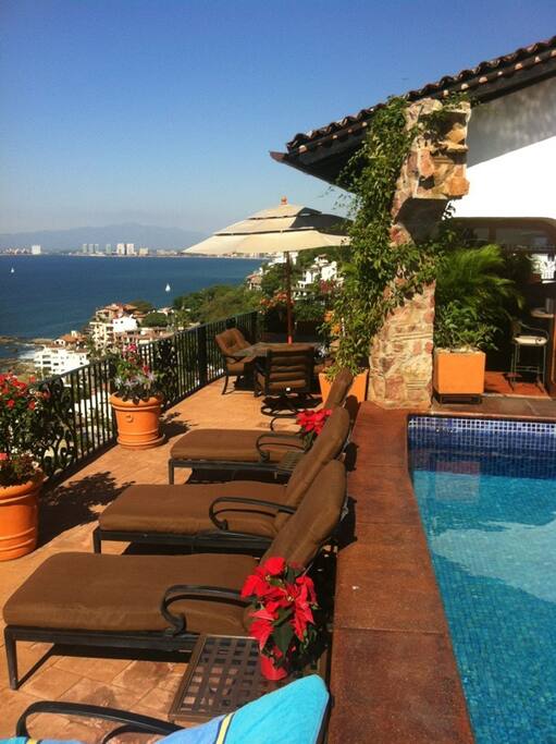 Beautiful private pool and outdoor speakers with a cascading waterfall.