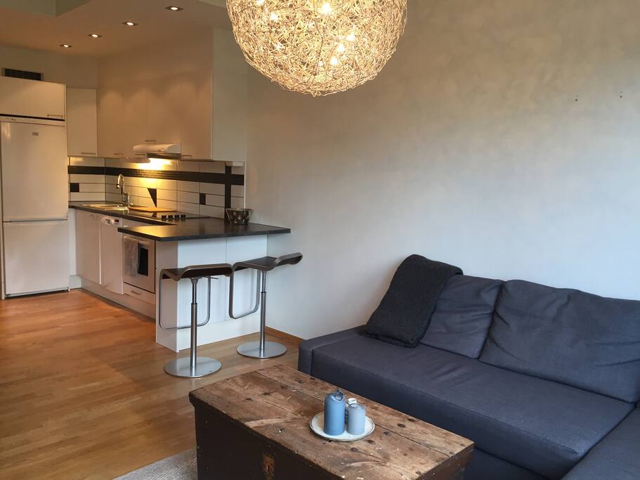 Open kitchen with enough space to make your favourite dish and a cosy eating place