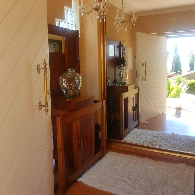 Main Entrance Hall with a co-host peeking at the door