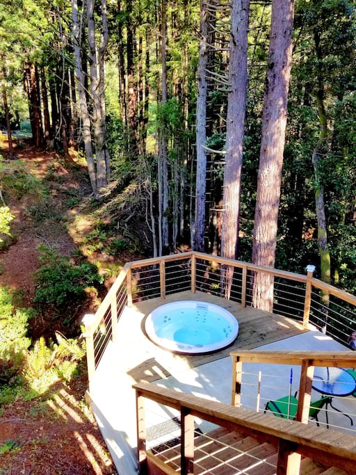 This amazing hot tub is surrounded by the nature, redwoods, creeks and pond! It was built on the unthinkable location...13 steps down from the upper deck.