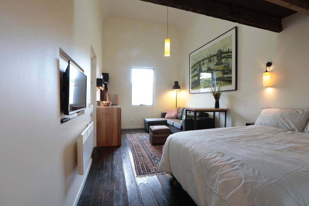 The Waiting Room is an architectural exploration of space. A private, compact, efficient space which includes private entry, courtyard, bathroom, office space as well as sleeping and dining space for two.