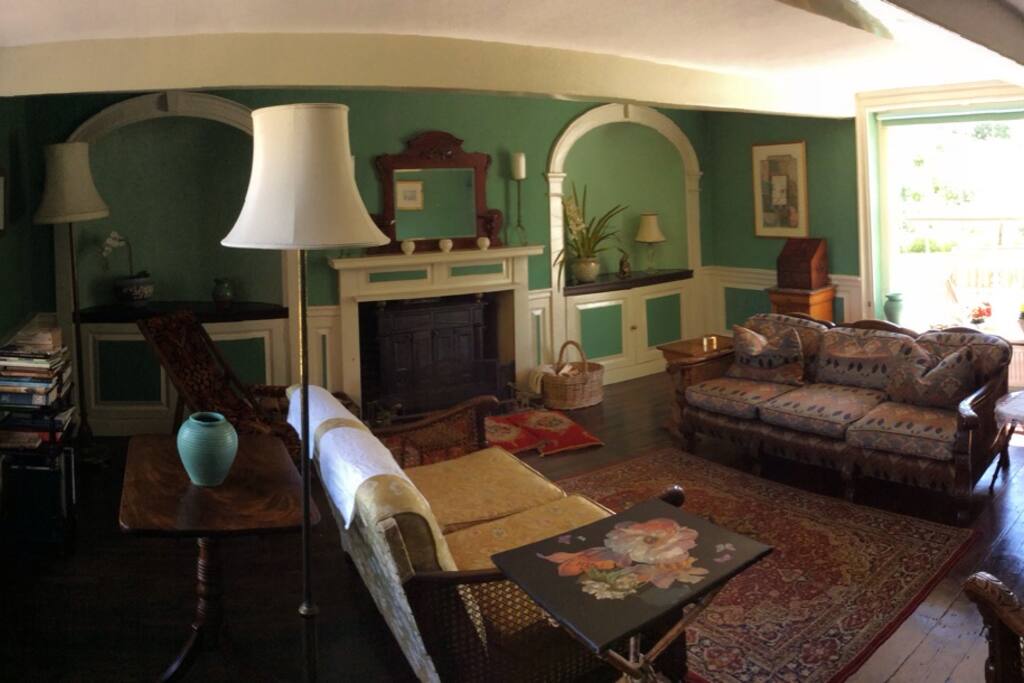 The guest exclusive sitting room with cosy open fire, and 'secret' television.......