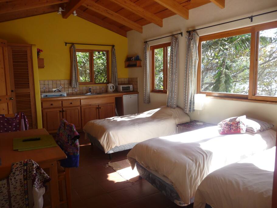 sleeping area and kitchenette