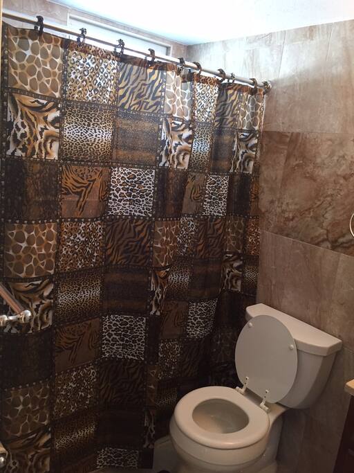 Newly remodeled bathroom with tub and shower.