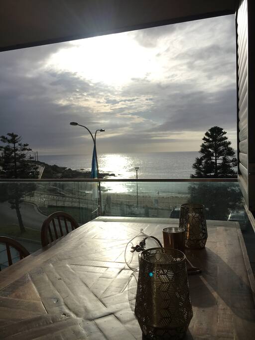 Huge dining table overlooking the water.