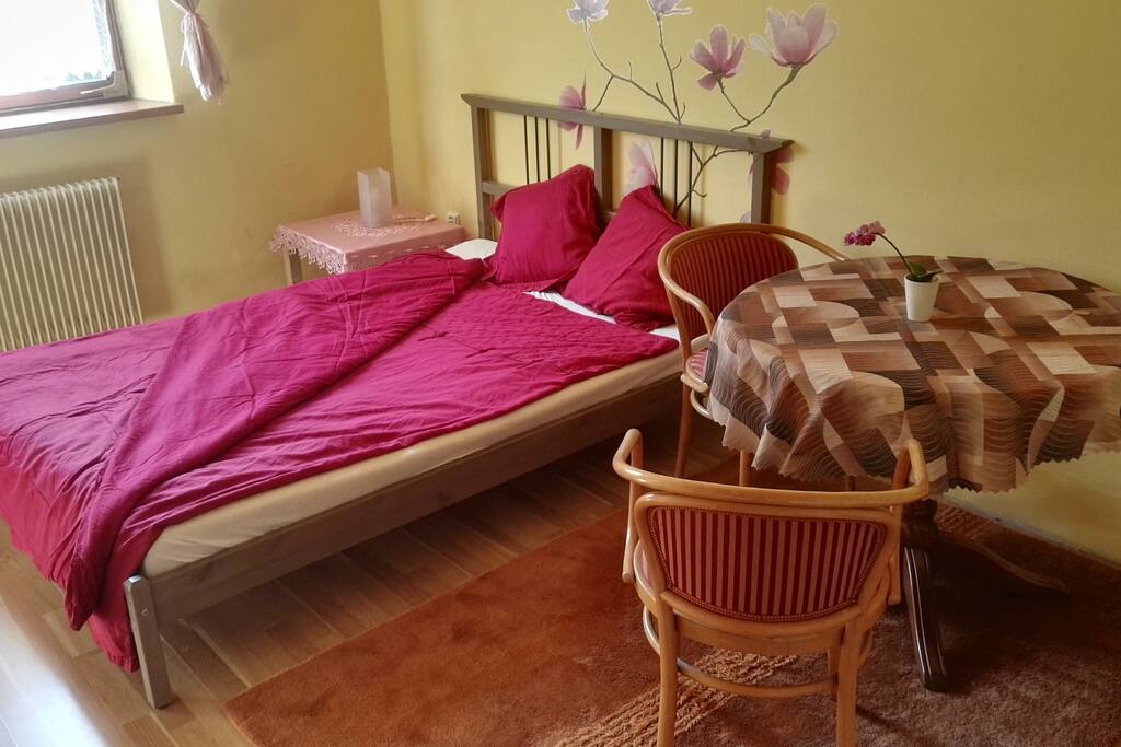 Bed room, window to the garden.
