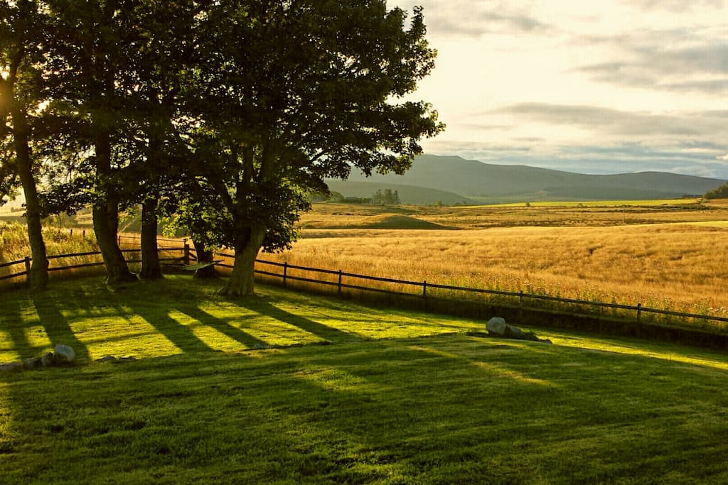 Autumn sun. View from the front garden as the sun rises over Ben Rinnes.