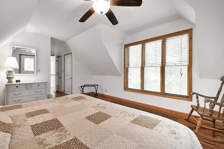 Upstairs master king suite offers amazing views as well as a small walk out deck perfect for morning coffee!