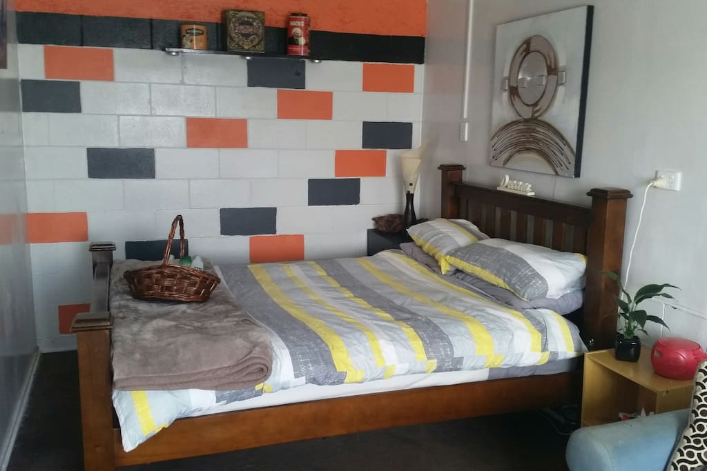 The main comfy queen bed. Watch the tv in bed if you choose