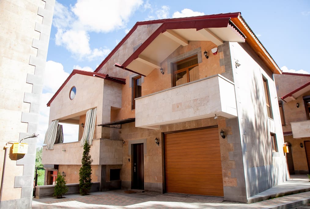The Villa's front door and private garage.