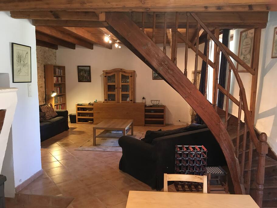 Large open living area, split from kitchen/diner by spiral staircase