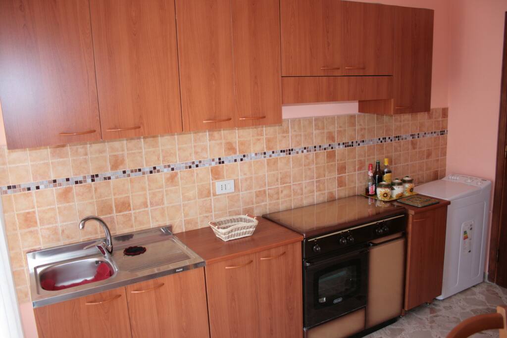 sink and oven and stoves