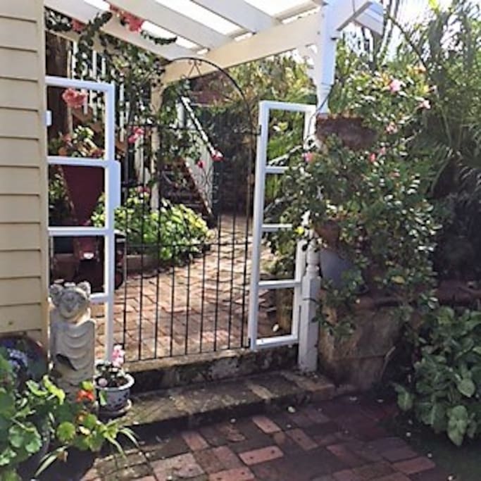 Through the airy gate to the stairs just ahead