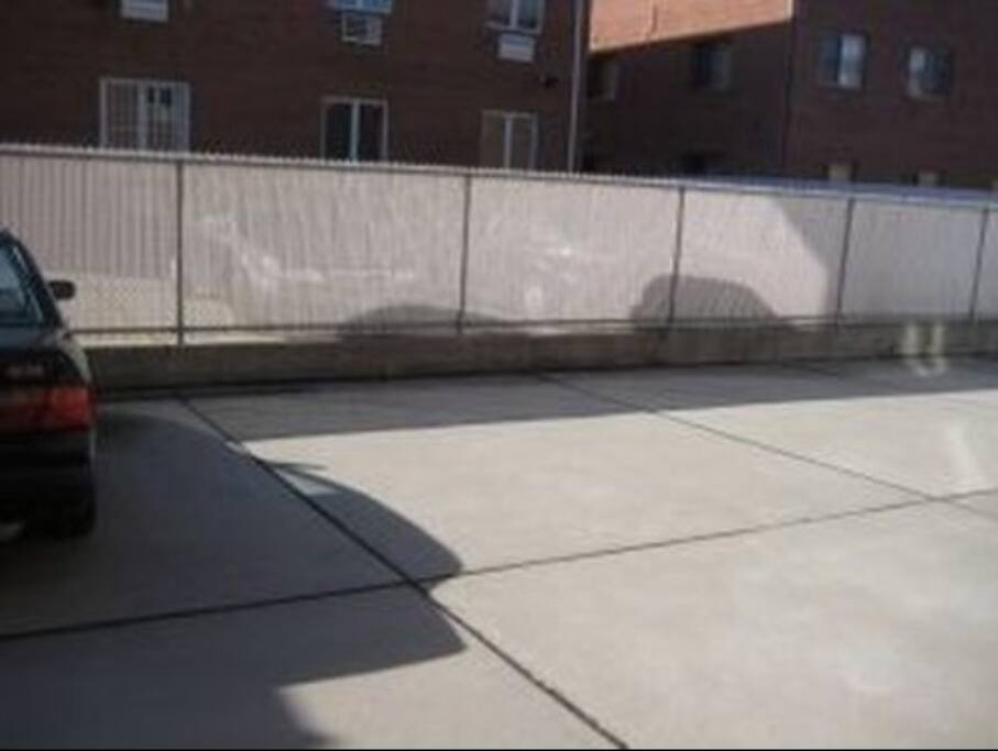 Parking spot, located directly behind condominium.