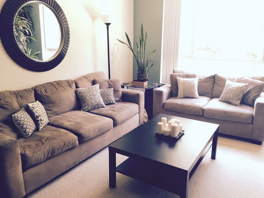 Spacious living area with comfortable couches.