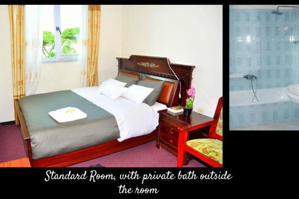 Two standard rooms, each with its own bathroom located outside the rooms.