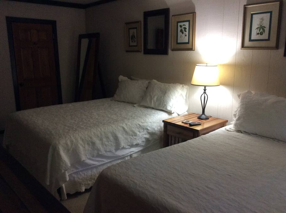 Another picture of well appointed downstairs bedroom.