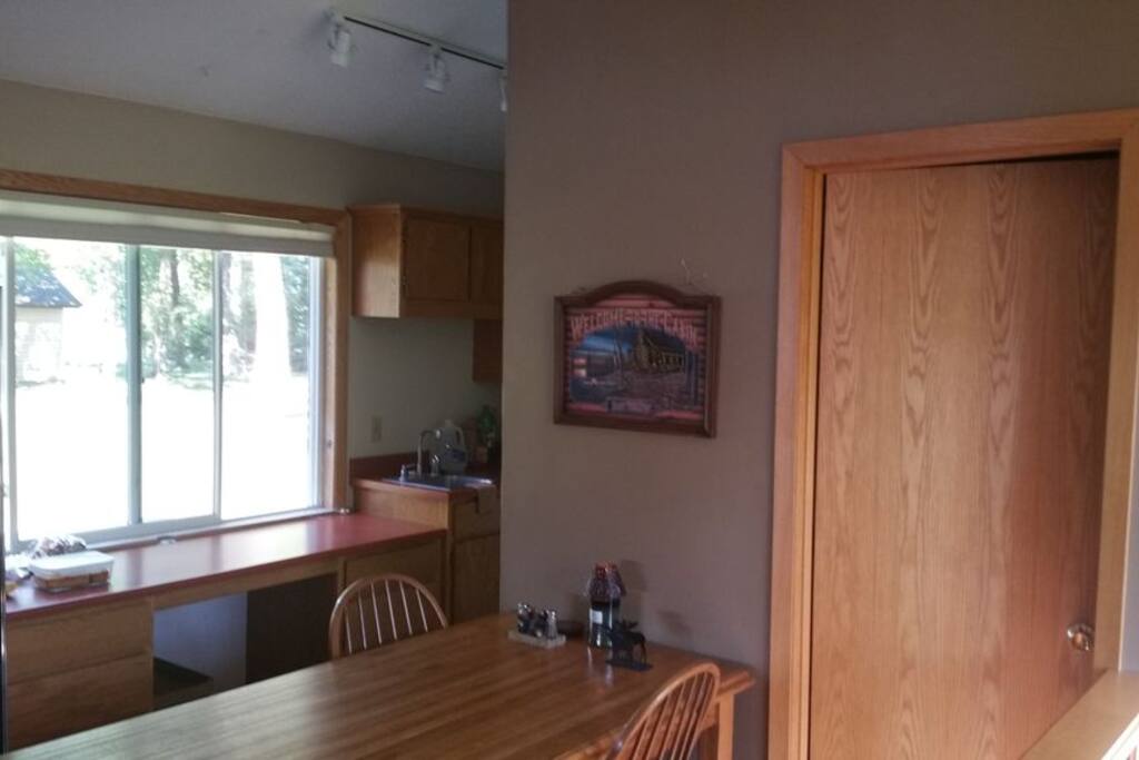 Bathroom located off of kitchen/dining