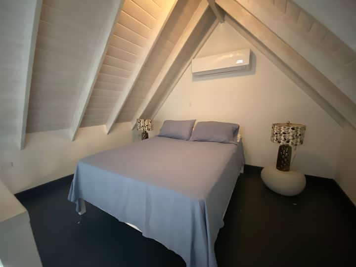 Mezzanine bedroom sleeping quarters.