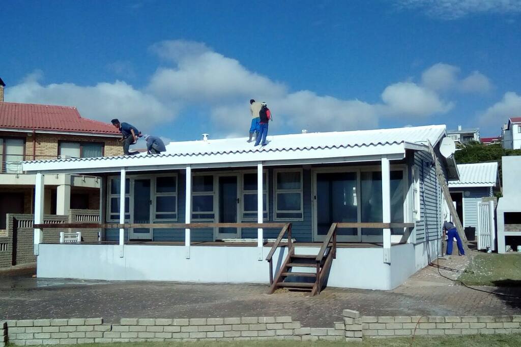 front of house with direct access to beach