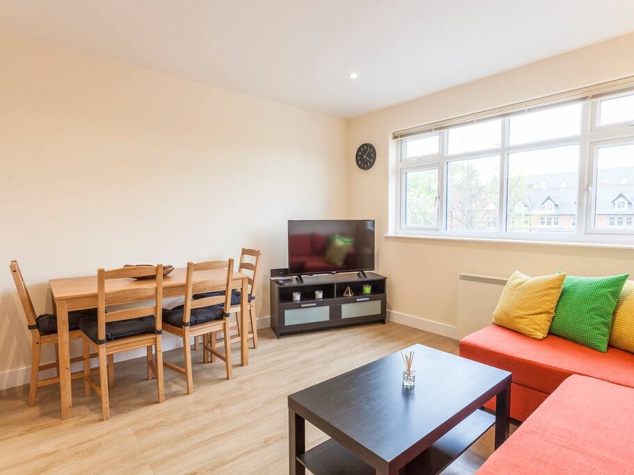 Kick back and watch some TV, or enjoy a meal in the dining area.