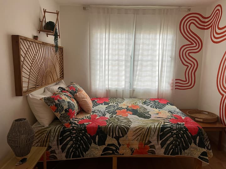 Sun Room-
Queen size bed, large bean bag, closet, with AC.