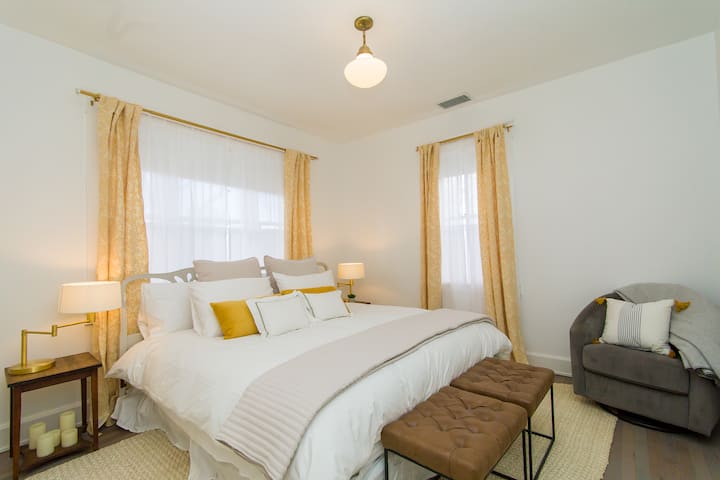 Commodious king in master with luxe linens. 