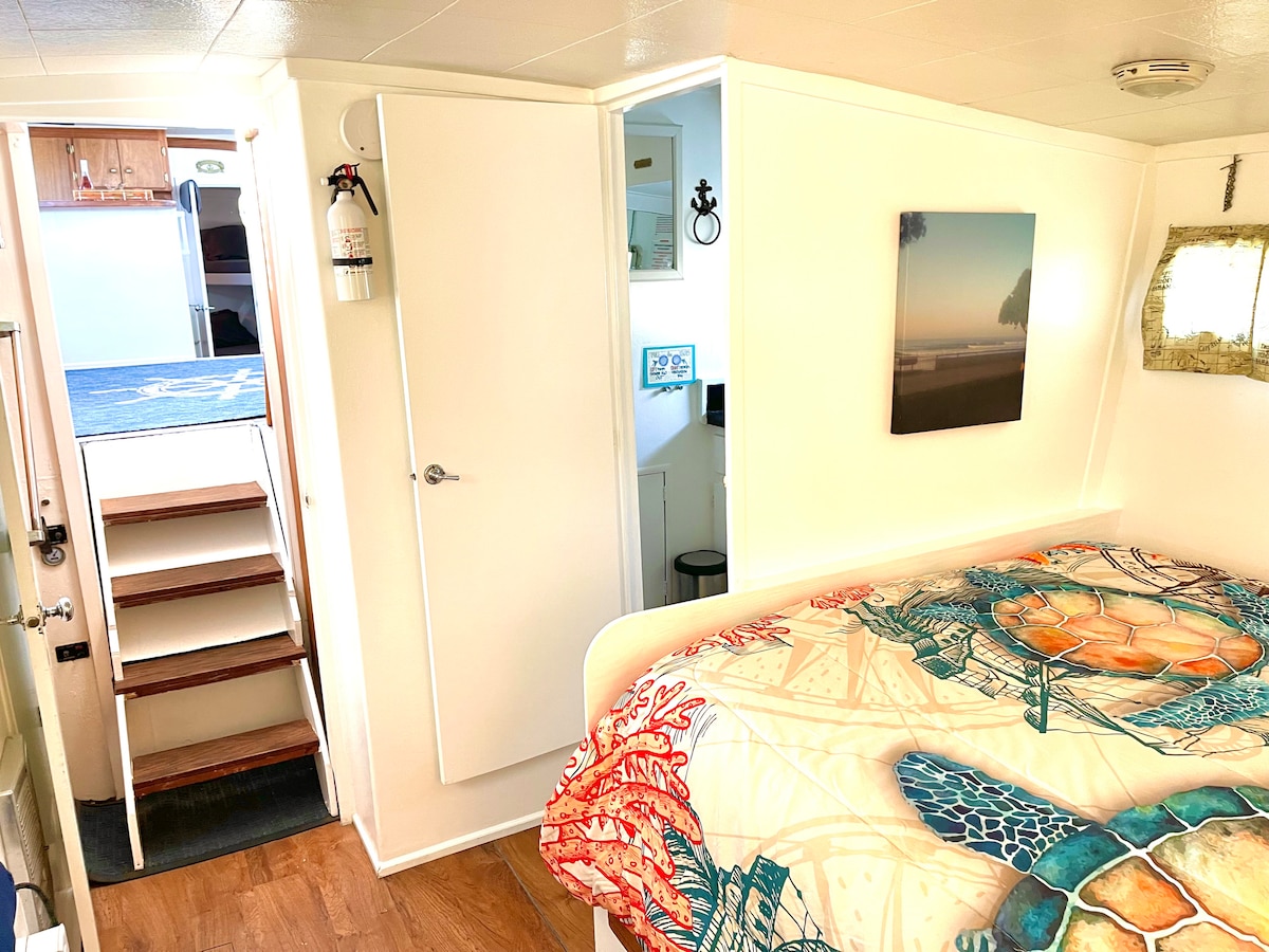 View from master bed to living room and bathroom. 