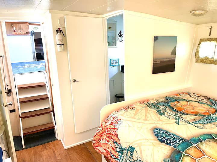 View from master bed to living room and bathroom. 