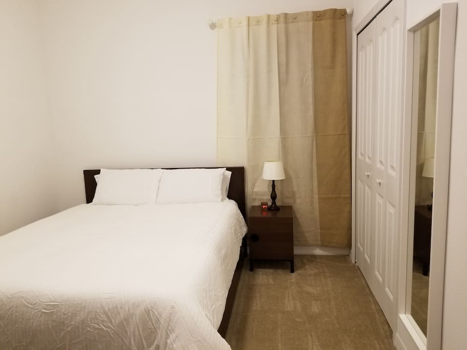 Closet, Full length mirror, Extra pillows and beddings stored under bed