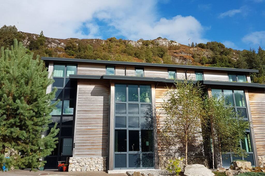 Stone, cedar wood and turf roof